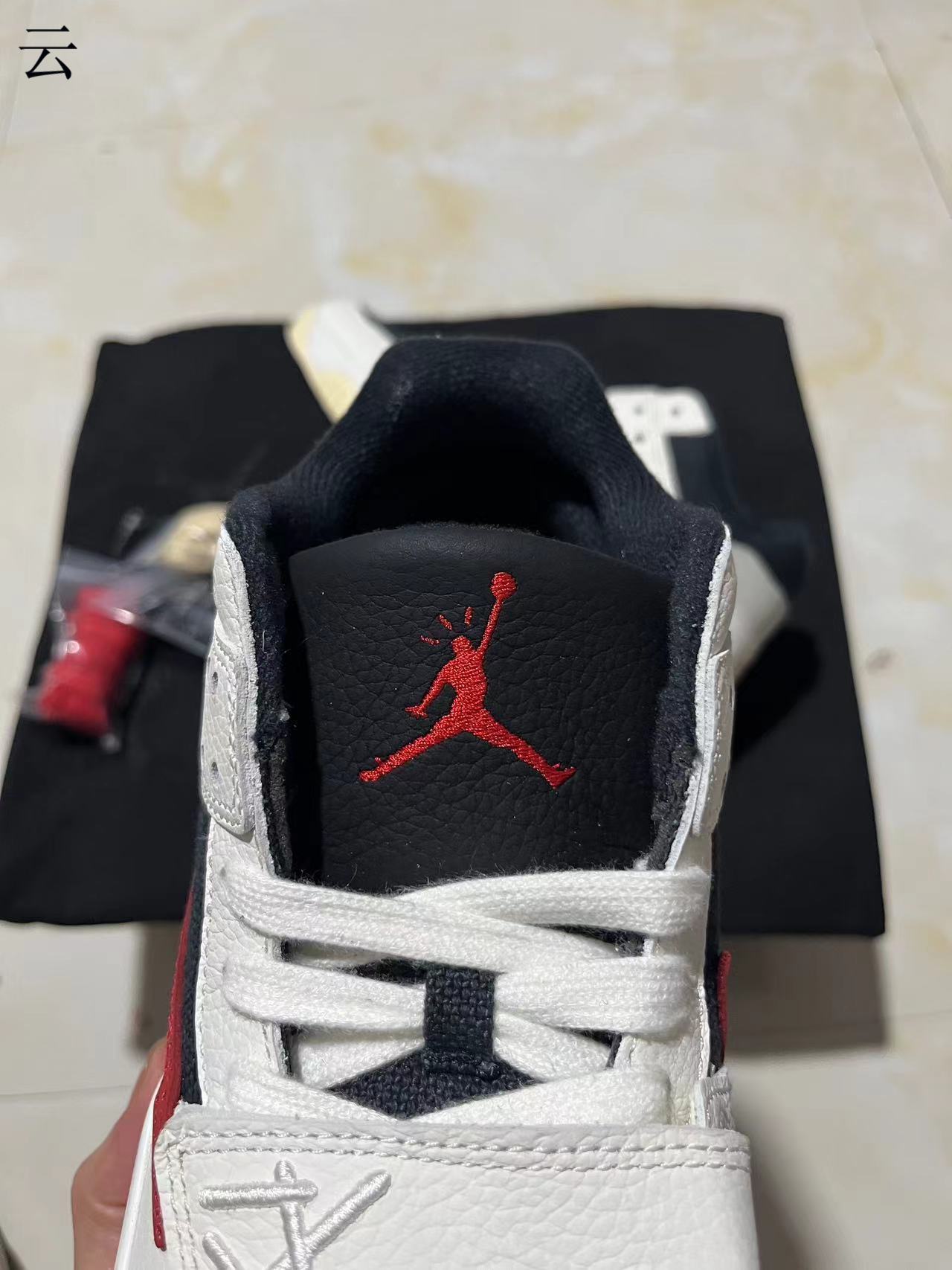 Jumpman Jack x Travis University Red