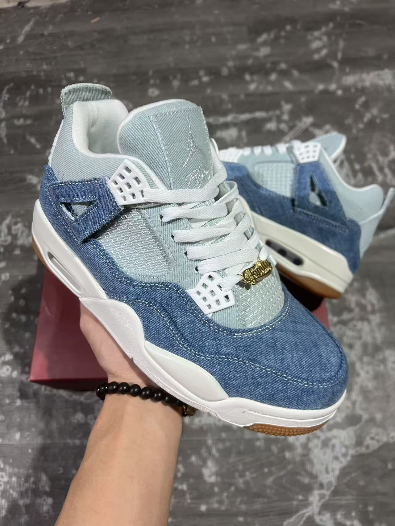 Air Jordan 4 Denim "Worn Blue”