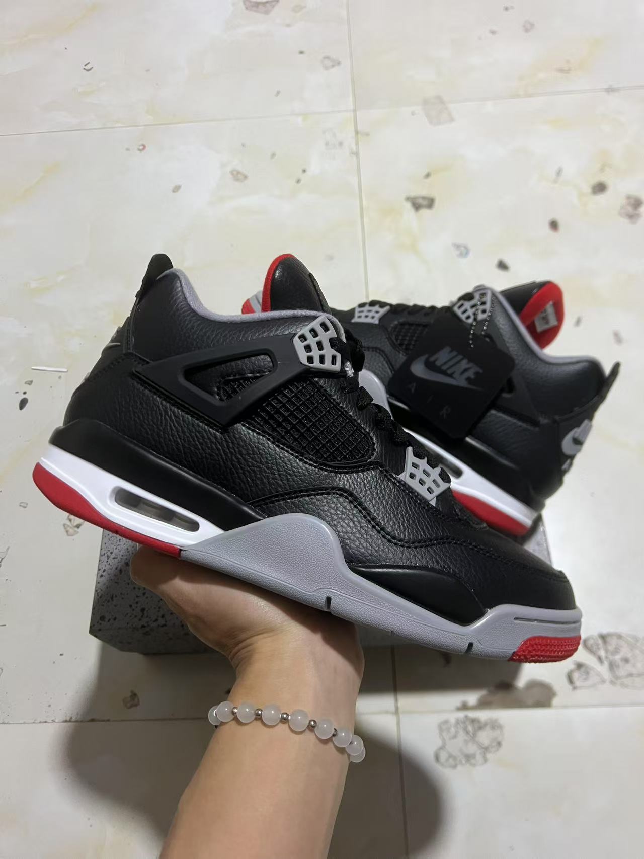 Air Jordan 4 Bred Reimagined